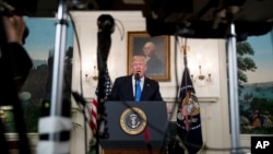 President Donald Trump speaks in the Diplomatic Room of the White House in Washington, June 14, 2017, about the shooting in Alexandria, Virginia.