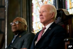 FILE - President Joe Biden sits with Rep. Jim Clyburn, D-S.C., at Mother Emanuel AME Church in Charleston, S.C., Monday, Jan. 8, 2024, where nine worshippers were killed in a mass shooting by a white supremacist in 2015.