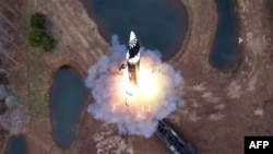 This picture taken on April 2, 2024 and released by North Korea's official Korean Central News Agency (KCNA) on April 3 shows the first test-fire of Hwasongpho-16B, a new-type intermediate-range solid-fueled ballistic missile, in Pyongyang's suburbs, in North Korea.