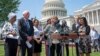 From left, Rep. Ilhan Omar, D-Minn., Democratic presidential candidate, Sen. Bernie Sanders, I-Vt., American Federation of Teachers President Randi Weingarten, and Rep. Pramila Jayapal, D-Wash., call for legislation to cancel student debt, in Washington, June 24, 2019.