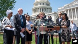 From left, Rep. Ilhan Omar, D-Minn., Democratic presidential candidate, Sen. Bernie Sanders, I-Vt., American Federation of Teachers President Randi Weingarten, and Rep. Pramila Jayapal, D-Wash., call for legislation to cancel student debt, in Washington, June 24, 2019.