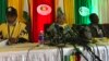 Zimbabwe Electoral Commission head Priscilla Chigumba speaks to reporters and observers in Harare flanked by deputy Joyce Kazembe and her chief officer Utoile Silaigwana, July 30, 2018. She said two presidential candidates had violated electoral laws by c