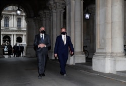 US Secretary of State Antony Blinken, left, walks with Dominic Raab, Britain's Secretary of State for Foreign, Commonwealth and Development Affairs into Downing Street ahead of a press conference at No 9 Downing Street in London, May 3, 2021.