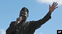 FILE - Opposition leader Raila Odinga addresses his supporters in Nairobi, Kenya, Nov. 28, 2017.