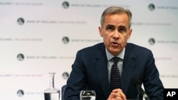 Bank of England Governor, Mark Carney, speaks during a media conference to present the central bank's quarterly Inflation Report, in London, Aug. 2, 2018. 