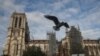 With Choir in Hard Hats, Fire-ravaged Notre Dame Rings in Christmas