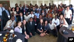 Group photo of participants, organizers, and US government officials at the welcoming lunch conference, in Washington, DC, August, 2011. 