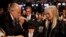 Former mayor of New York City Rudy Giuliani, kisses Miriam Adelson's hand at Hofstra University in Hempstead, N.Y. Miriam Adelson is a philanthropist and humanitarian, but is perhaps best known as the wife of Sheldon Adelson who is considered a powerful Republican donor.