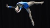 Malaysia&#39;s Tang Ing Yueh competes in the women&#39;s artistic gymnastic balance beam final event of the 29th Southeast Asian Games (SEA Games) in Kuala Lumpur, Malaysia.