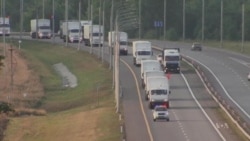 Russian Convoy Enroute to Ukraine Raises Suspicions in Ukraine, West