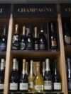 Bottles of Champagne are for sale at a shop in Ville d'Avray, outside Paris, as President Donald Trump threatened a 200% tariff on European wine, Champagne and spirits if the European Union goes forward with a planned tariff on American whiskey, March 13, 2025.