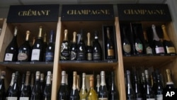 Bottles of Champagne are for sale at a shop in Ville d'Avray, outside Paris, as President Donald Trump threatened a 200% tariff on European wine, Champagne and spirits if the European Union goes forward with a planned tariff on American whiskey, March 13, 2025.