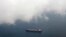 FILE - A tanker travels through the Singapore Strait.