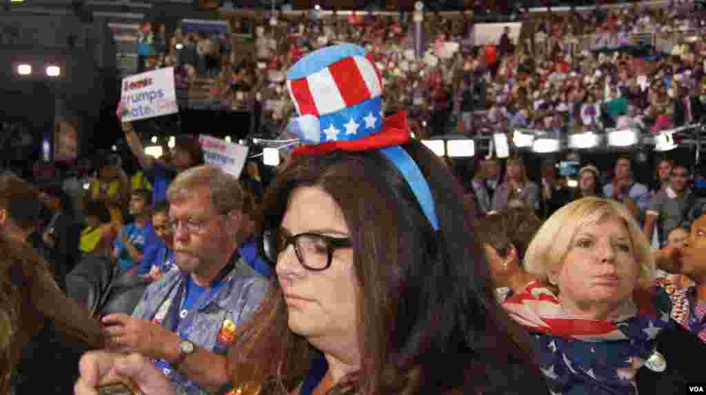 Delegates sport their hats at the DNC in Philadelphia (Photo: S. Barua/VOA)