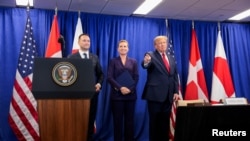 US President Donald Trump, Danish Prime Minister Mette Frederiksen and Greenland Prime Minister Jens-Frederik Nielsen attend a trilateral signing event  in New York City, US, September 22, 2026. REUTERS/Kylie Cooper
