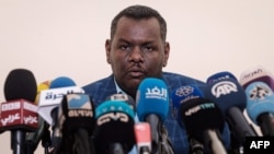 Sudanese protest leader Madani Abbas Madani delivers a speech during a press conference in Khartoum, Sudan, June 12, 2019.