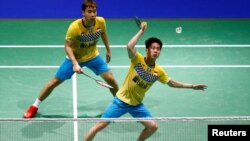 Pasangan ganda putra Indonesia Kevin Sanjaya da Marcus Fernaldi Gideon saat berlaga di putaran kedua ganda putra Kejuaraan Dunia Bulu Tangkis BWF 2019 di St. Jakobshalle Basel, Basel, Switzerland, 21 Agustus 2019. (Foto: Reuters)