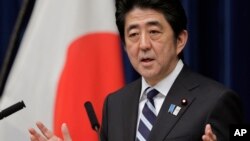 Thủ tướng Nhật Bản Shinzo Abe nói chuyện tại cuộc họp báo về Hiệp định TPP