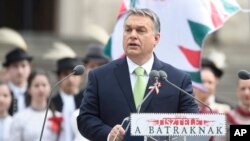 FILE - Hungarian Prime Minister Viktor Orban speaks at the Hungarian National Museum in Budapest, March 15, 2017. 