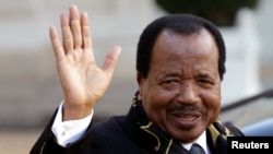 FILE - Cameroon's President Paul Biya departing a meeting at the Elysee Palace in Paris.