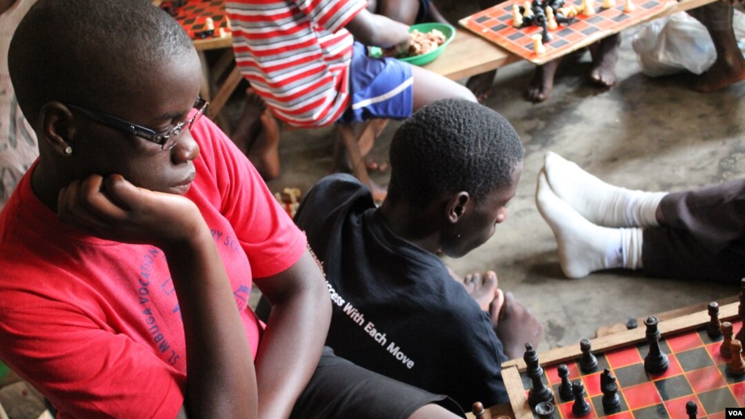 Phiona Mutesi considers a move at the Sports Outreach ministry in Kampala, Uganda, January 28, 2012. (H. Heuler/VOA)