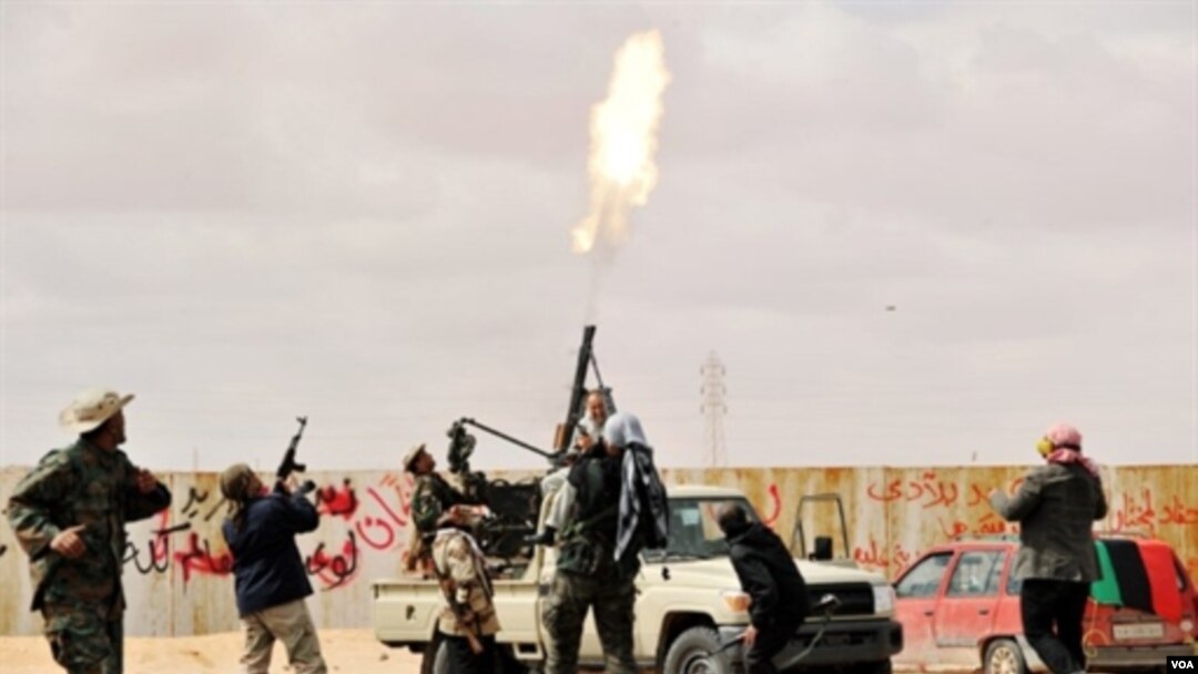 Foto hasil jepretan fotografer AFP Roberto Schmidt sebelum ditahan pasukan pemerintah Libya.