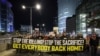 Demonstrators raise placards and wave flags during a protest calling for the release of hostages held captive in Gaza since the October 7, 2023 attack by Palestinian militants, in front of the Israeli Defence Ministry in Tel Aviv on January 25, 2025.