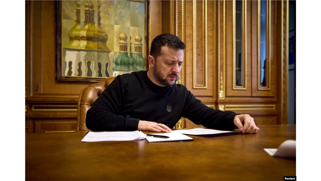 FILE - Ukrainian President Volodymyr Zelenskyy speaks with U.S. House of Representatives Speaker Mike Johnson by phone in Kyiv on March 28, 2024. (Ukrainian Presidential Press Service via Reuters)