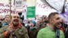 CETA Trade Deals: Protesters shout slogans during a march against trade deals with Canada and the U.S. in Warsaw, Poland, Saturday, Oct. 15, 2016.