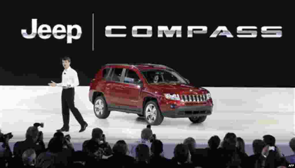 Mike Manley, president and CEO of the Jeep brand at Chrysler, discusses the 2011 Jeep Compass at the North American International Auto Show in Detroit, Monday, Jan. 10, 2011. (AP Photo/Paul Sancya)