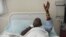 An injured Kenyan policeman lies on a hospital bed in Nairobi on November 11, 2012 recounting how he an others were attacked in Baragoi, Samburu North District yesterday. 