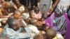 Dr. Hadiza Sabuwa Balarabe, acting governor of Kaduna state, inspects people rescued from a purported correctional facility in Zaria, at the Kaduna state headquarters of the Nigeria Security and Civil Defense Corps. (Kaduna state government photo)