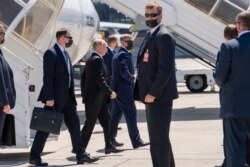 Russian President Vladimir Putin, third left, arrives for the US - Russia summit with US President Joe Biden in Switzerland, June 16, 2021.