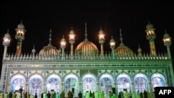 In this picture taken on May 5, 2021, devotees offer 'Taraweeh' evening prayer at the Markazi Jamia mosque during Muslim's holy month of Ramadan in Rawalpindi amid the Covid-19 coronavirus pandemic.