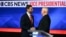 TOPSHOT - US Senator and Republican vice presidential candidate J.D. Vance (L) and Minnesota Governor and Democratic vice presidential candidate Tim Walz shake hands at the end of the Vice Presidential debate hosted by CBS News at the CBS Broadcast Center
