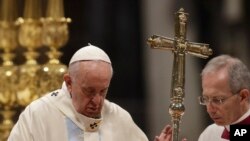 Pope Francis presides over a Mass for the solemnity of St. Mary at the beginning of the new year, in St. Peter's Basilica at the Vatican, Jan. 1, 2020. 