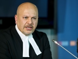 FILE PHOTO: Defense counsel Karim Khan appears before a trial at the International Criminal Court in The Hague on Sept. 9, 2013.