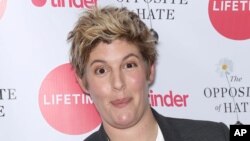 FILE - Sally Kohn appears at a launch event for her book, "The Opposite of Hate," in New York, April 6, 2018. In the past, Kohn, who appears as a commentator on CNN, has reached out kindly to anti-Semitic harassers, but she says she does less of that now. 