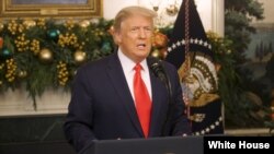 President Trump calls for more COVID-19 aid money for Americans in a video posted to Twitter Dec. 22, 2020.