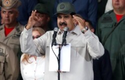 FILE - Venezuela's President Nicolas Maduro speaks in Caracas, July 2, 2019.