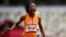 Marie-Josee Ta Lou, of the Ivory Coast, wins a heat in the women’s 100-meter run at the 2020 Summer Olympics, July 30, 2021, in Tokyo. 