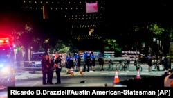 Polisi bekerja di tempat kejadian setelah suara tembakan terdengar di pusat kota Austin, Texas, pada 31 Juli 2016. (Foto: AP/Ricardo B.Brazziell/Austin American-Statesman)