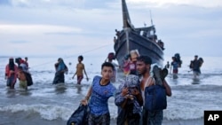 Rohingya refugees disembark at Ulee Madon, North Aceh, Indonesia, on Nov. 16, 2023. Some 250 Rohingya Muslims are afloat off the coast of Indonesia after two attempts to land were rejected by local residents.