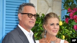 FILE - Tom Hanks and Rita Wilson have tested positive for the novel coronavirus