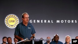 FILE - United Auto Workers President Gary Jones speaks during the opening of their contract talks with General Motors in Detroit, July 16, 2019.