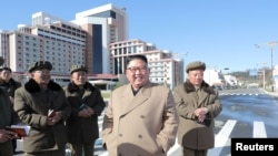 North Korea's leader Kim Jong Un provides field guidance to construction sites in Samjiyon County, in this undated picture released by North Korea's Central News Agency, Oct. 16, 2019. 