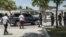 ဟေတီနိုင်ငံ Port-au-Prince မြို့တော်မှာတွေ့ရတဲ့ အမေရိကန်ပြည်ထောင်စုက အဖွဲ့။ (ဇူလိုင် ၁၁၊ ၂၀၂၁)