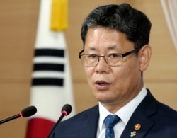 FILE - South Korean Unification Minister Kim Yeon-chul speaks to the media in Seoul, South Korea, June 19, 2019. South Korea says it plans to send 50,000 tons of rice to North Korea through the World Food Program.