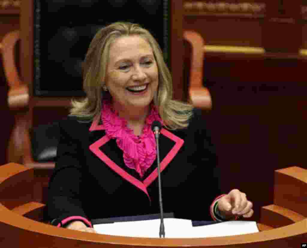 U.S. Secretary of State Hillary Rodham Clinton reacts whilst making her speech at the Albanian Parliament in capital Tirana Thursday, Nov. 1, 2012. Hillary Clinton arrived in EU-hopeful Albania on the last leg of her Balkans tour where she is expected to 