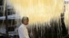 A Muslim worker offers Friday prayers as he stands under vermicelli arranged to dry used to make traditional sweets dishes popular in the fasting month of Ramadan, during a nationwide coronavirus lockdown, at a factory in Allahabad, India.